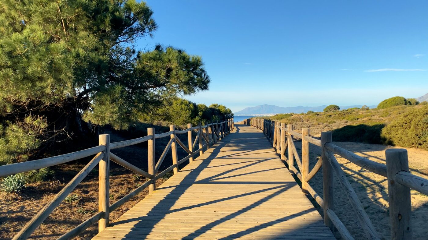 Constructed boardwalk, the protected natural area of Dunas de Artola, near Cabopino Beach, Marbella, Spain